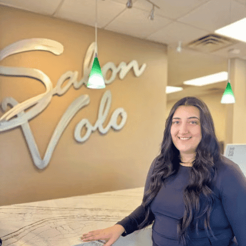 Portrait of Ashley Hatzopoulos, a professional stylist at Salon Volo Inc., showcasing their expertise and style.
