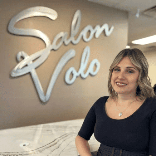 Portrait of Christine Klein, a professional stylist at Salon Volo Inc., showcasing their expertise and style.