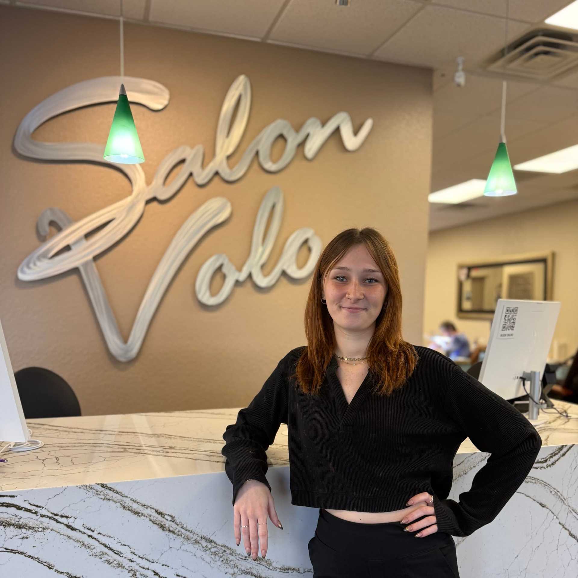 Portrait of Makayla Mills, a professional stylist at Salon Volo Inc., showcasing their expertise and style.