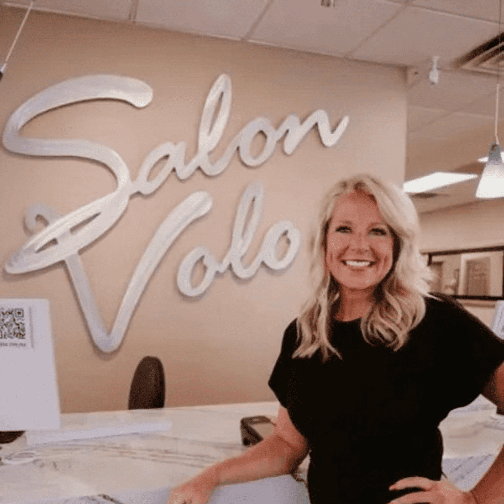 Portrait of Amber, a professional stylist at Salon Volo Inc., showcasing their expertise and style.