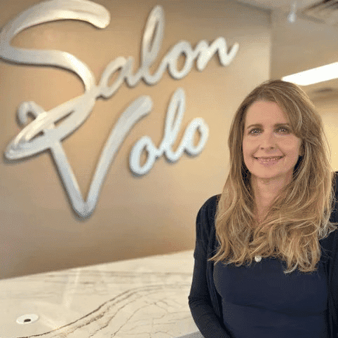 Portrait of Karen Kelly, a professional stylist at Salon Volo Inc., showcasing their expertise and style.