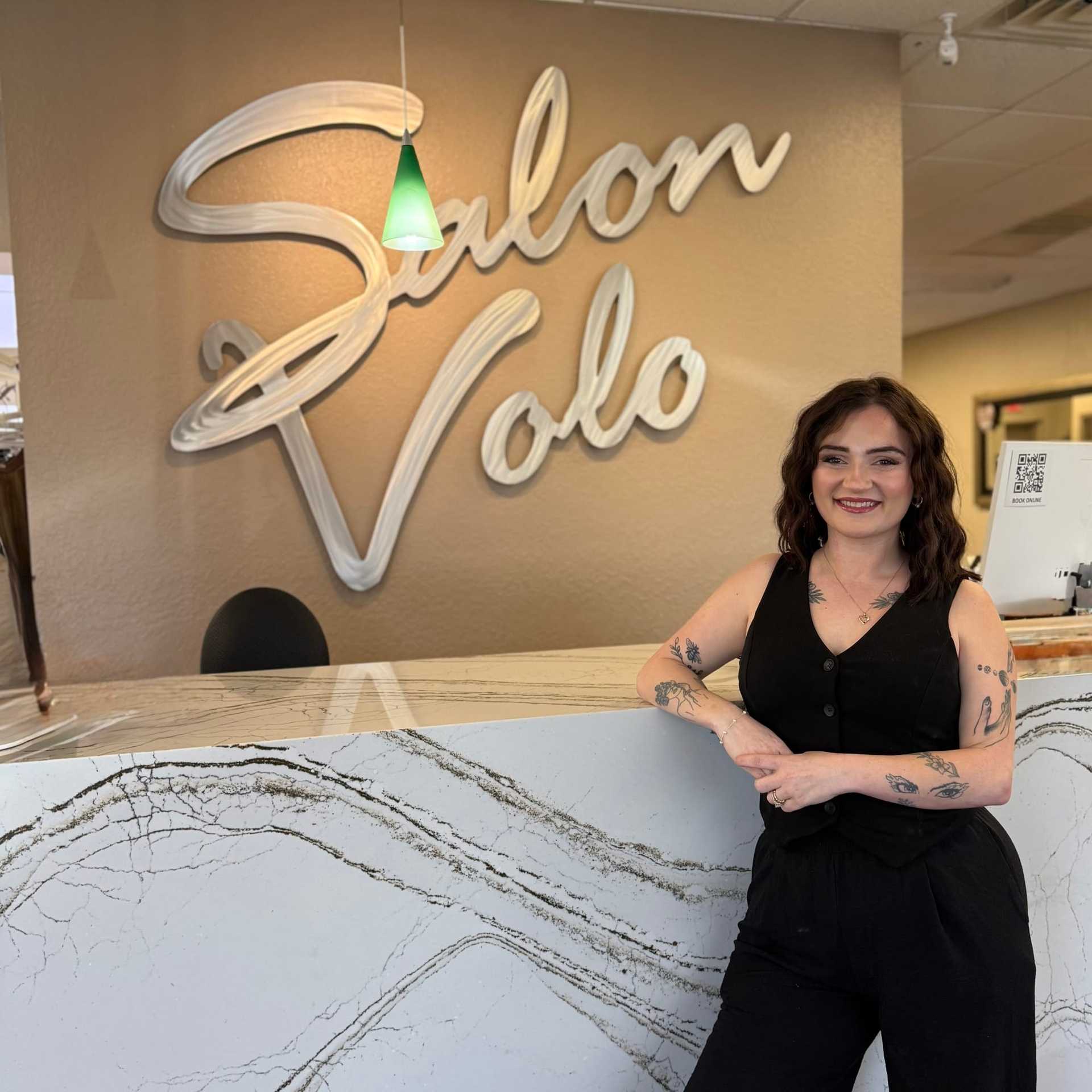 Portrait of Hannah DeVega, a professional stylist at Salon Volo Inc., showcasing their expertise and style.