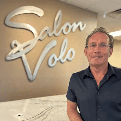 Portrait of Rob Godfrey, a professional stylist at Salon Volo Inc., showcasing their expertise and style.