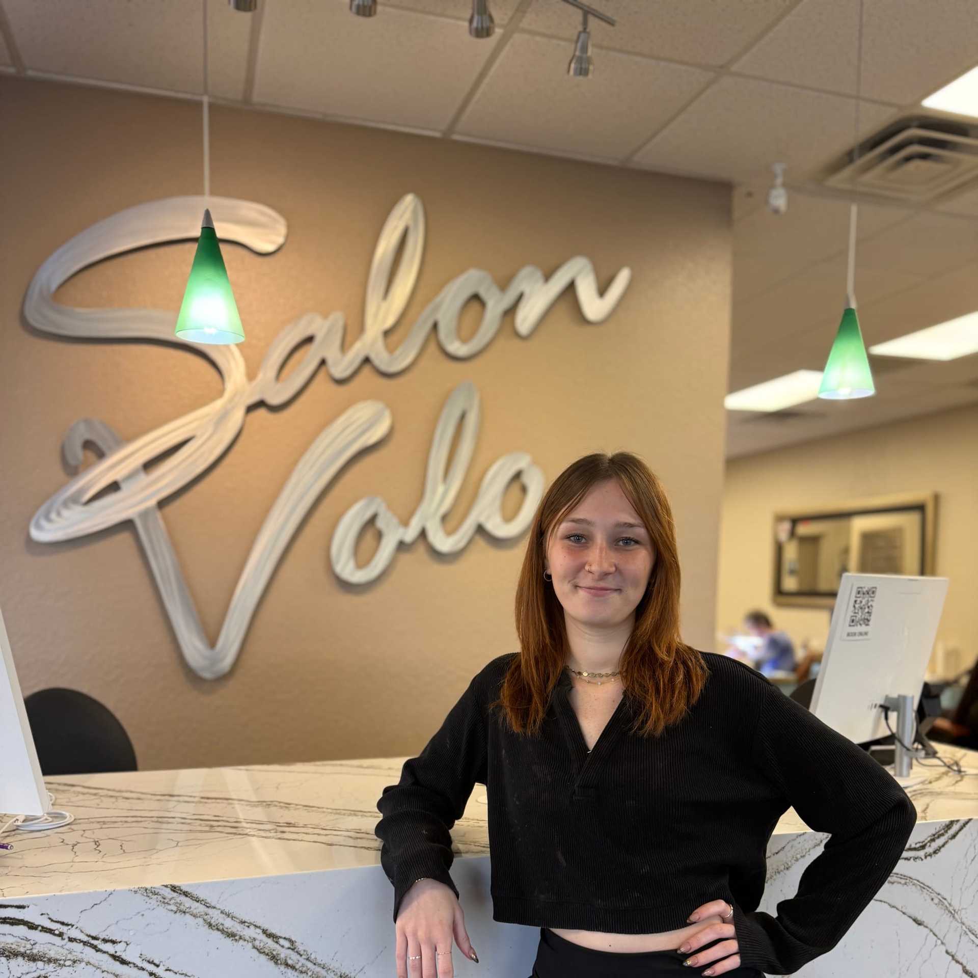 Portrait of Makayla Mills, a professional stylist at Salon Volo Inc., showcasing their expertise and style.
