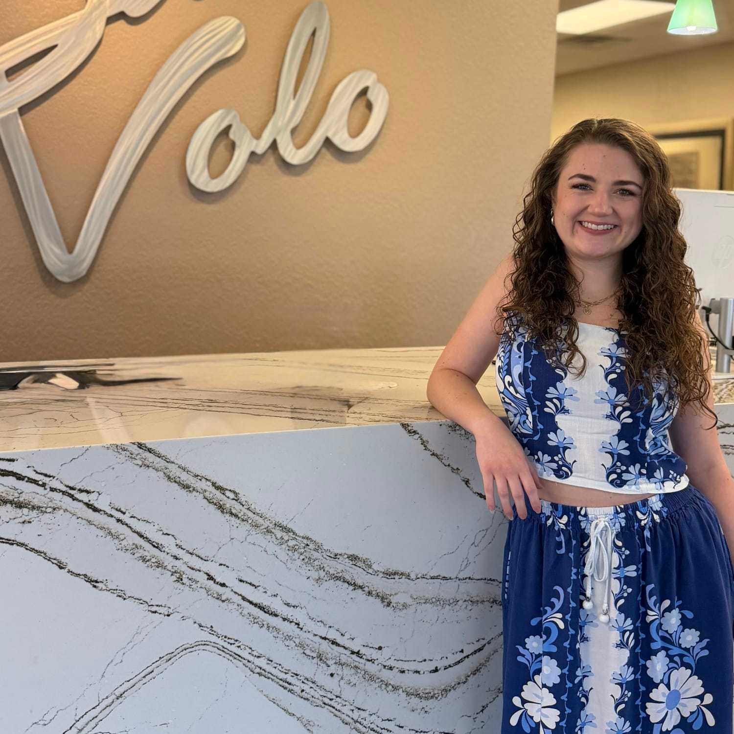 Portrait of Violet Santopolo, a professional stylist at Salon Volo Inc., showcasing their expertise and style.