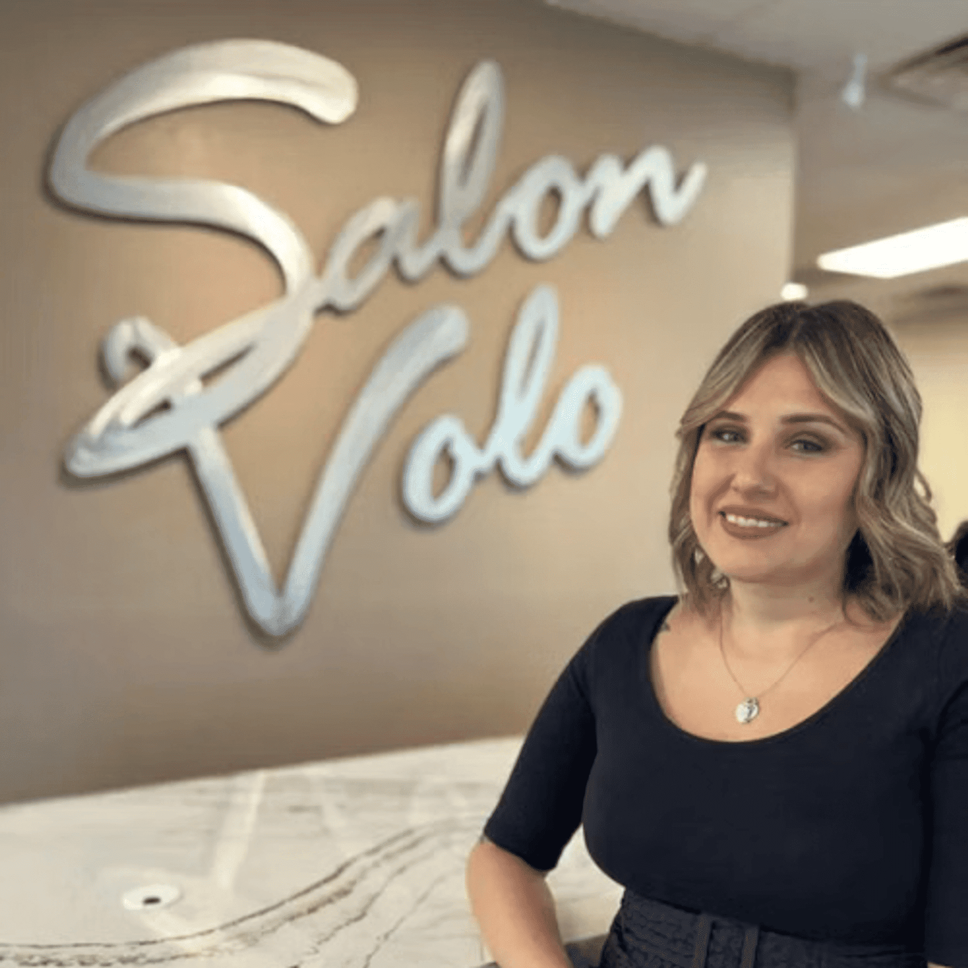 Portrait of Christine Klein, a professional stylist at Salon Volo Inc., showcasing their expertise and style.