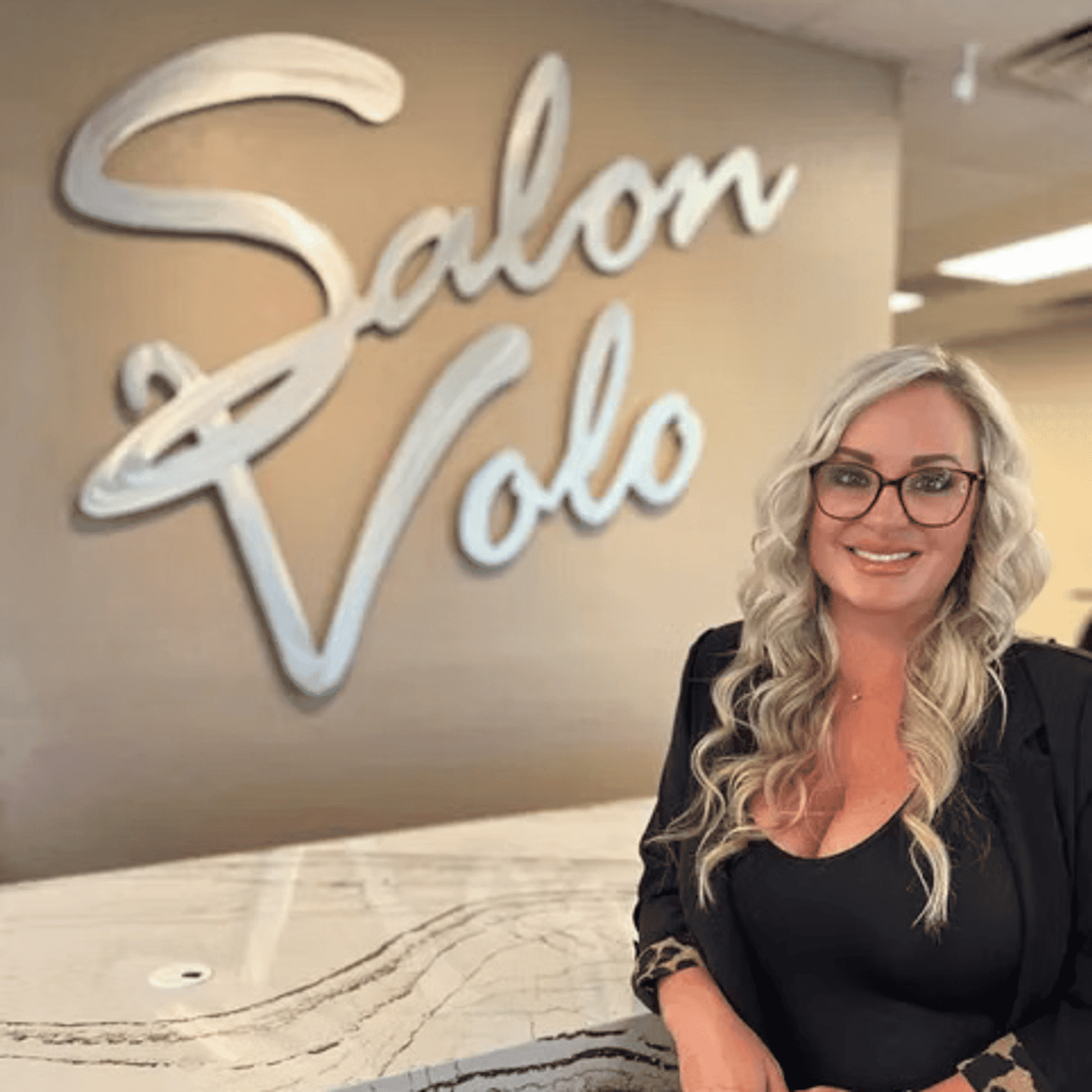 Portrait of Stephanie Wilcox-Lowe, a professional stylist at Salon Volo Inc., showcasing their expertise and style.