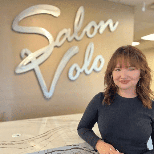 Portrait of Alyssa Young, a professional stylist at Salon Volo Inc., showcasing their expertise and style.